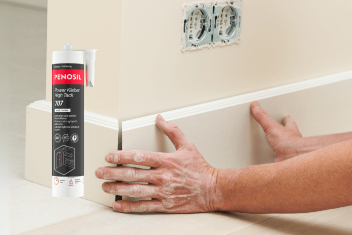 Penosil Hybridklebstoff 707 im Hintergrund bei der Montage von Sockelleisten