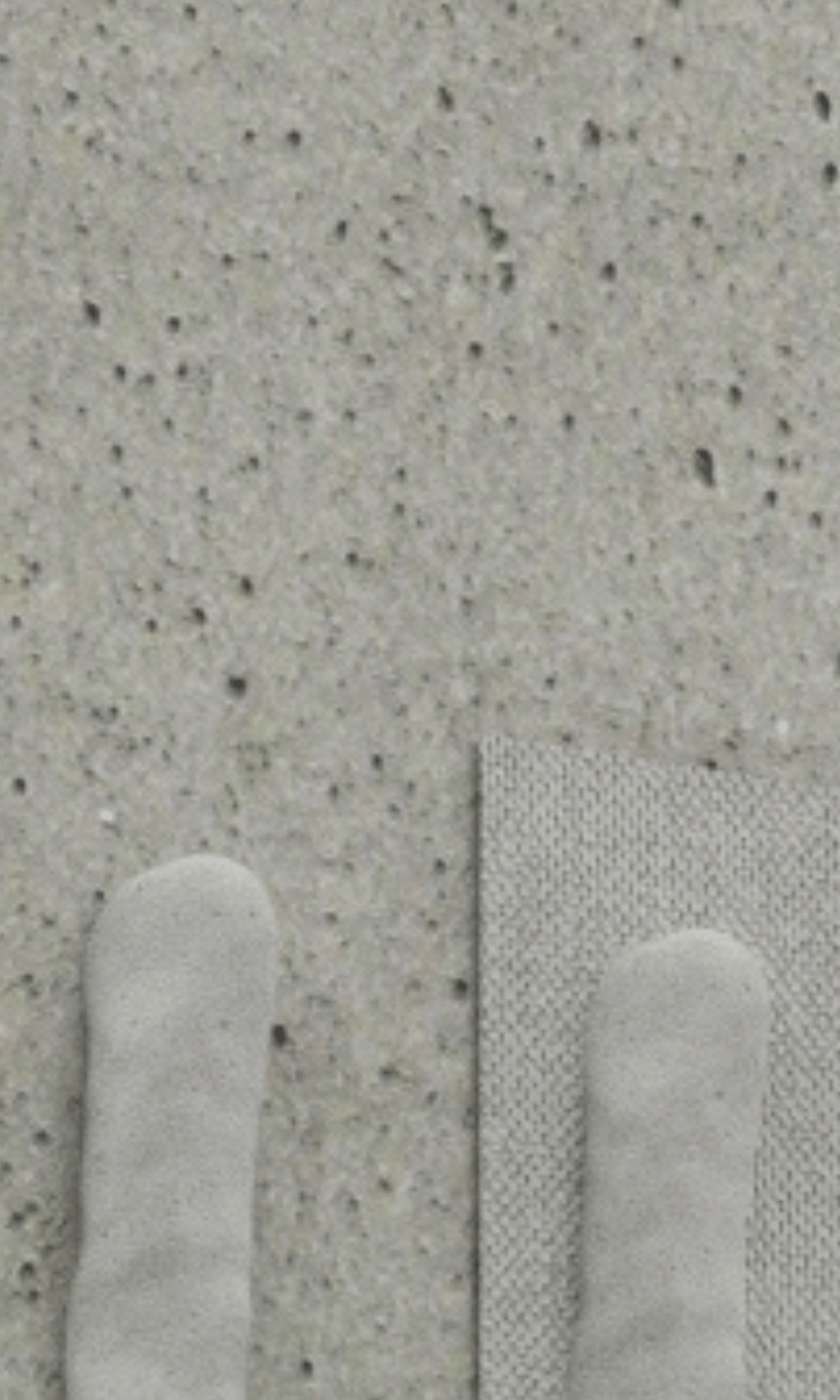 Priming porous surfaces in ventilated brick facade system