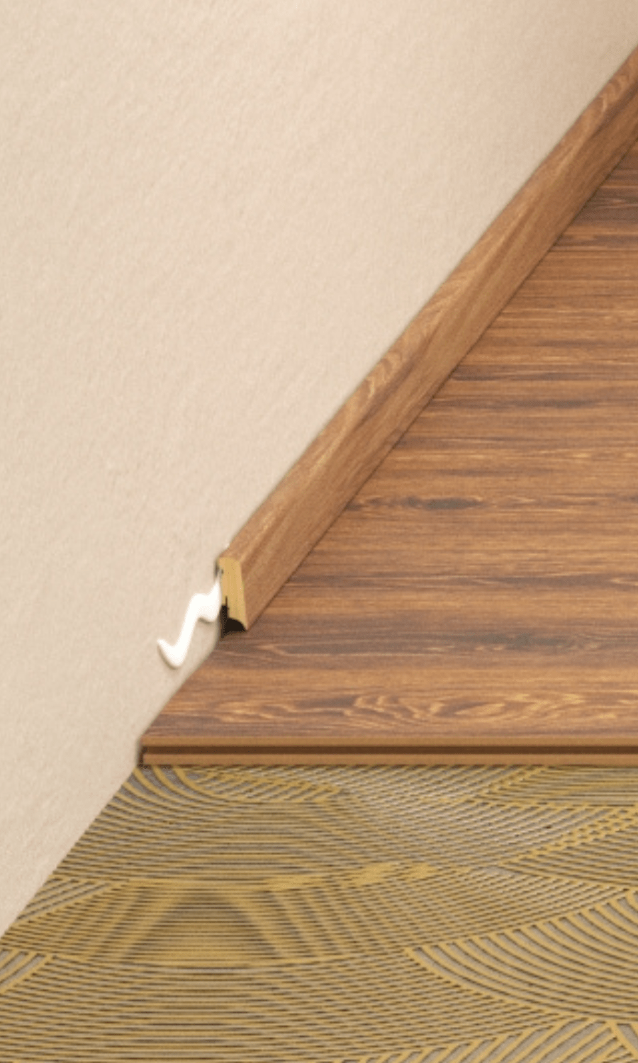 Close-up view of gluing skirting boards after parquet installation