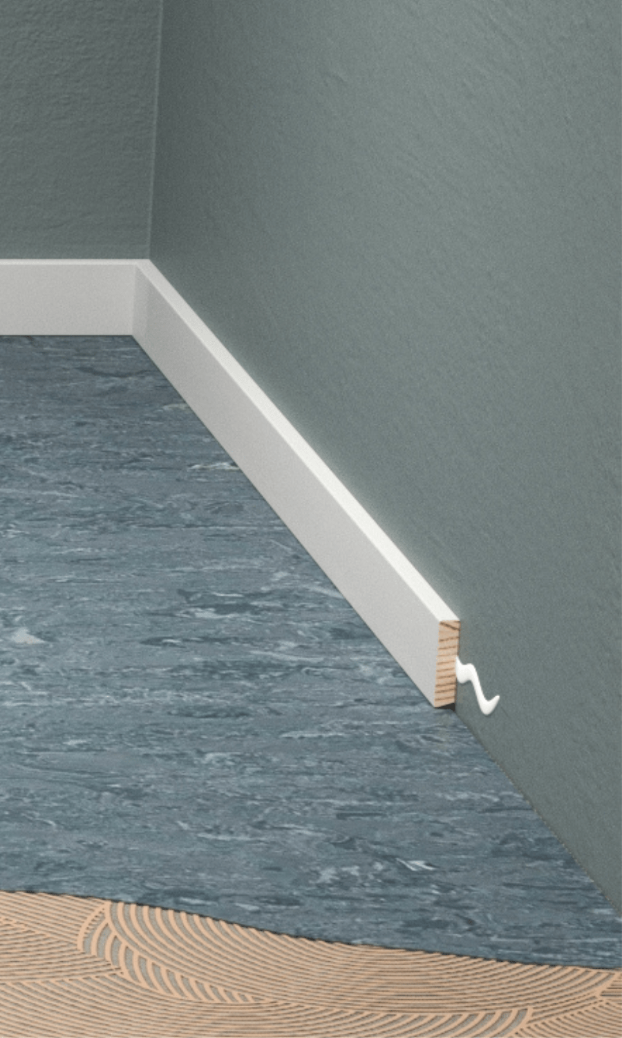 Close-up view of gluing the skirting boards after the soft floor covering installation
